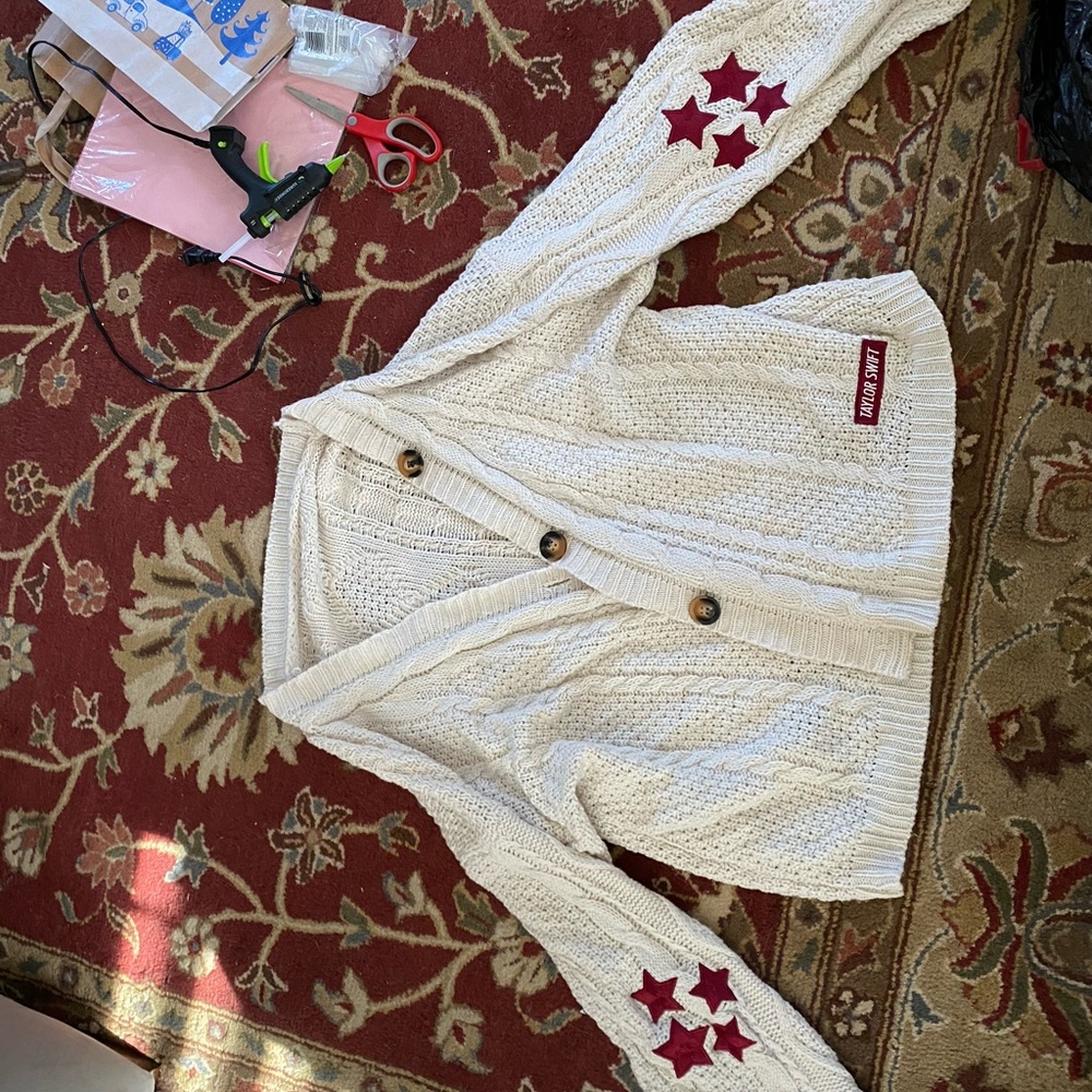Taylor Swift Cream Cardigan with Red Star Accents